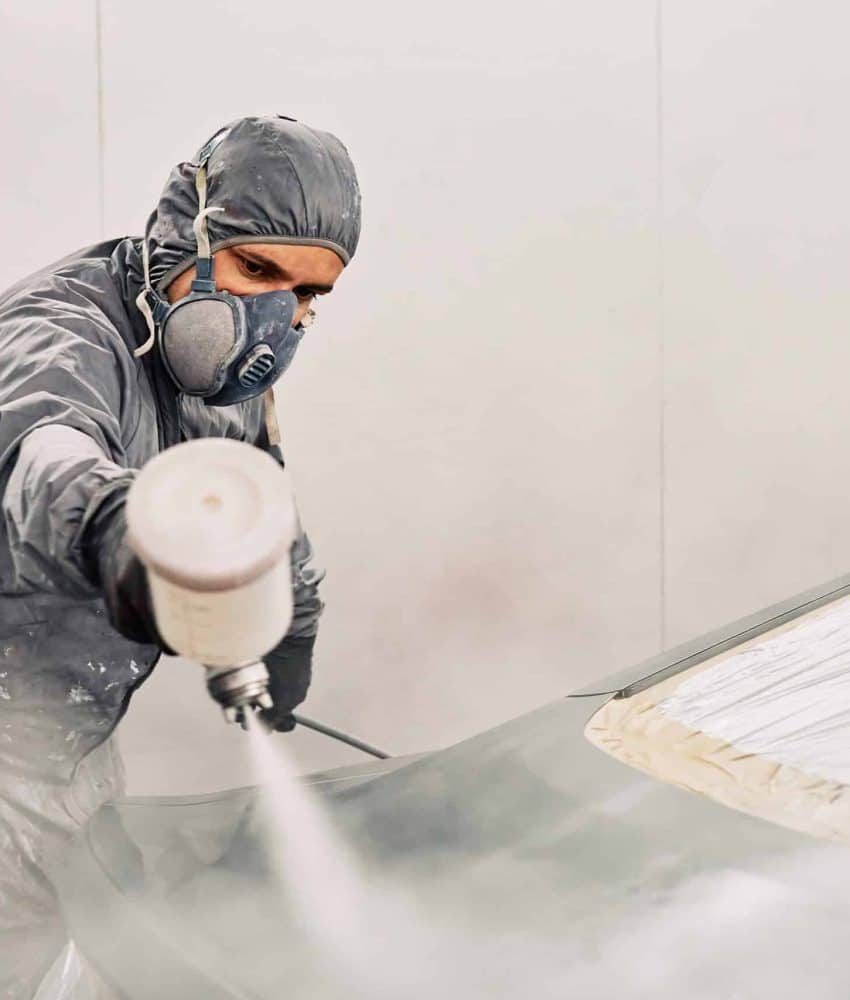 a-man-painting-a-car-2022-10-24-22-34-06-utc-scaled-qdnrp15zjcbutbbtpbvwc1gexfioii0ooyo30us6ts